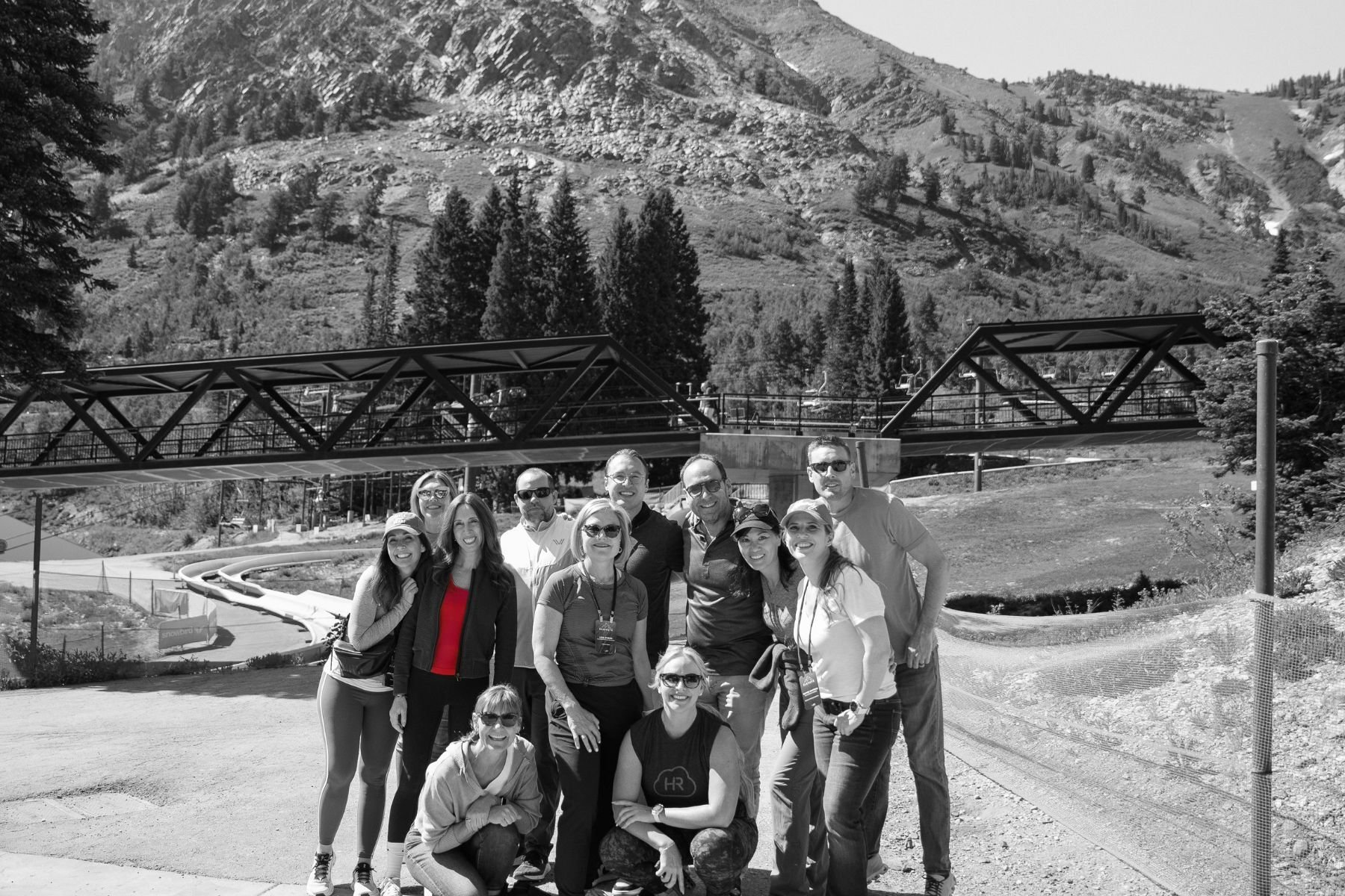 Group in front of bridge